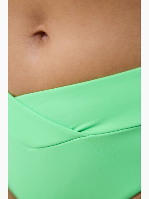 Slip bikinibroekje met v-snede penti - Kiabi Slip bikinibroekje met v-snede penti - Kiabi