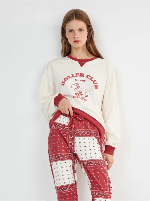 Snoopy pyjama met paisley bedrukte broek - Kiabi Snoopy pyjama met paisley bedrukte broek - Kiabi