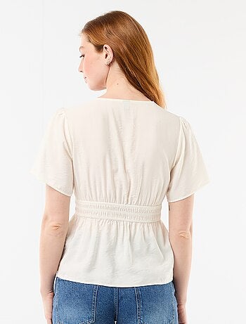 Soepele blouse met uitlopend model
