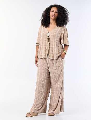 Soepele broek met borduursels