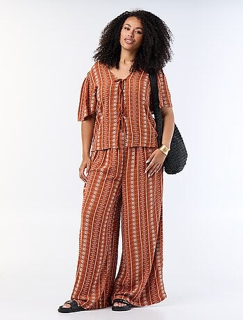 Soepele broek met borduursels