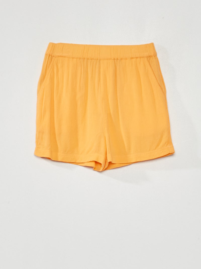 Soepelvallende, effen short oranje - Kiabi