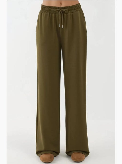 Soft modal touch sweatpants met wijde pijpen hiccup - Kiabi Soft modal touch sweatpants met wijde pijpen hiccup - Kiabi
