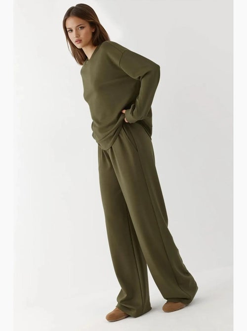 Soft modal touch sweatpants met wijde pijpen hiccup - Kiabi Soft modal touch sweatpants met wijde pijpen hiccup - Kiabi