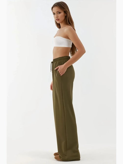 Soft modal touch sweatpants met wijde pijpen hiccup - Kiabi Soft modal touch sweatpants met wijde pijpen hiccup - Kiabi