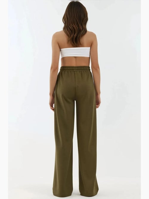 Soft modal touch sweatpants met wijde pijpen hiccup - Kiabi Soft modal touch sweatpants met wijde pijpen hiccup - Kiabi
