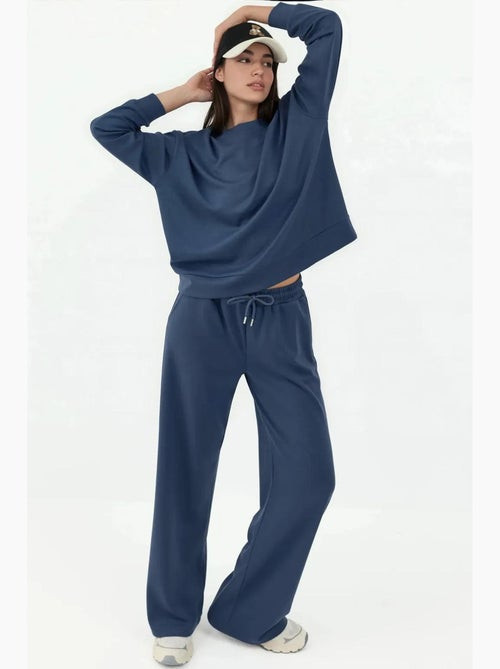 Soft modal touch sweatpants met wijde pijpen hiccup - Kiabi Soft modal touch sweatpants met wijde pijpen hiccup - Kiabi