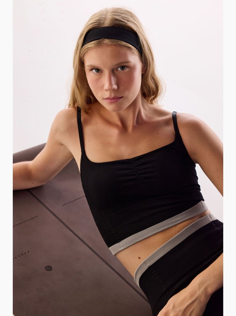 Soutien-gorge de sport rayé sans coutures penti Noir - Kiabi