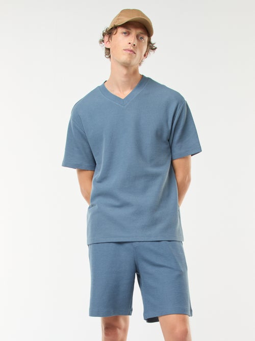 Sportshort met zakken en fantasiepatroontje - Kiabi