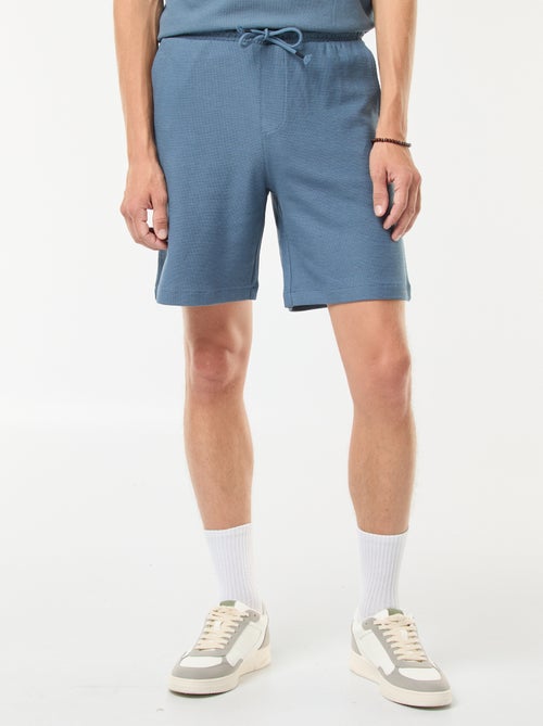 Sportshort met zakken en fantasiepatroontje - Kiabi