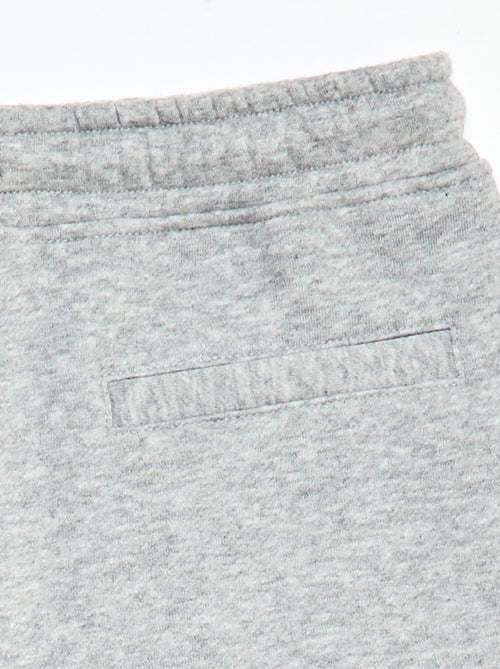 Sporttraining in ruimvallende joggingstof - Kiabi