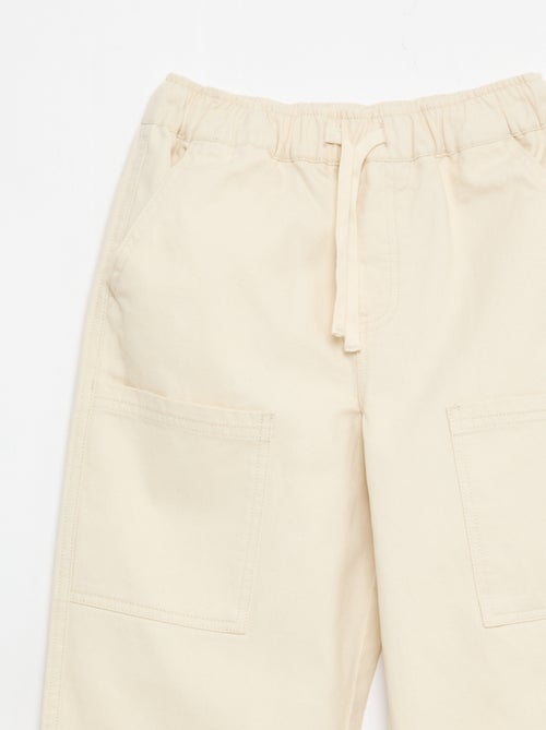 Sporttraining met opgestikte zijzakken - Kiabi Sporttraining met opgestikte zijzakken - Kiabi