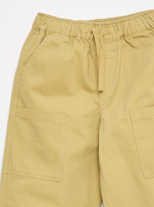 Sporttraining met opgestikte zijzakken - Kiabi