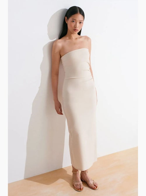 Strapless bodycon midi-jurk met split dilvin - Kiabi Strapless bodycon midi-jurk met split dilvin - Kiabi