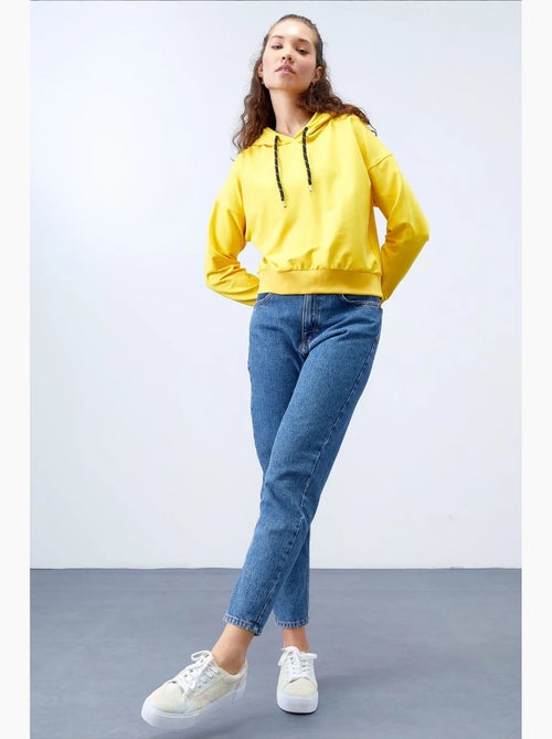 Sweat à capuche coupe décontractée avec lien tommy - Kiabi Sweat à capuche coupe décontractée avec lien tommy - Kiabi
