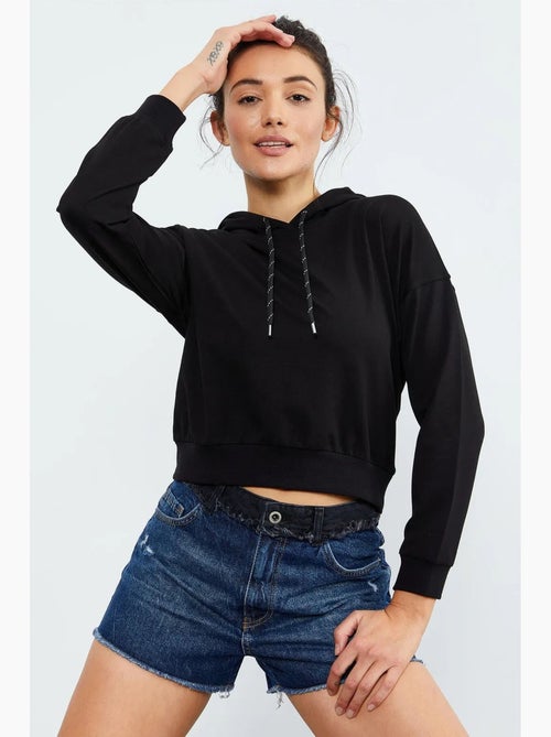 Sweat à capuche coupe décontractée avec lien tommy - Kiabi Sweat à capuche coupe décontractée avec lien tommy - Kiabi