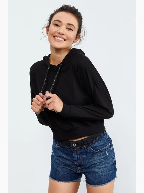 Sweat à capuche coupe décontractée avec lien tommy - Kiabi Sweat à capuche coupe décontractée avec lien tommy - Kiabi