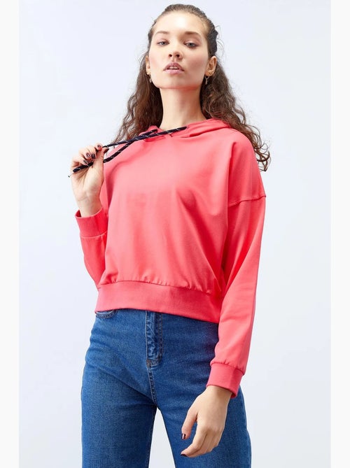 Sweat à capuche coupe décontractée avec lien tommy - Kiabi Sweat à capuche coupe décontractée avec lien tommy - Kiabi