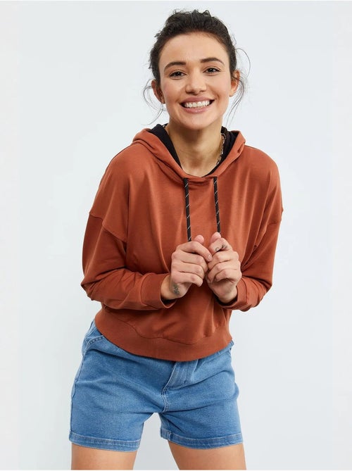 Sweat à capuche coupe décontractée avec lien tommy - Kiabi Sweat à capuche coupe décontractée avec lien tommy - Kiabi