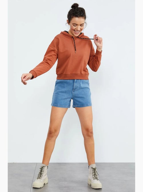 Sweat à capuche coupe décontractée avec lien tommy - Kiabi Sweat à capuche coupe décontractée avec lien tommy - Kiabi