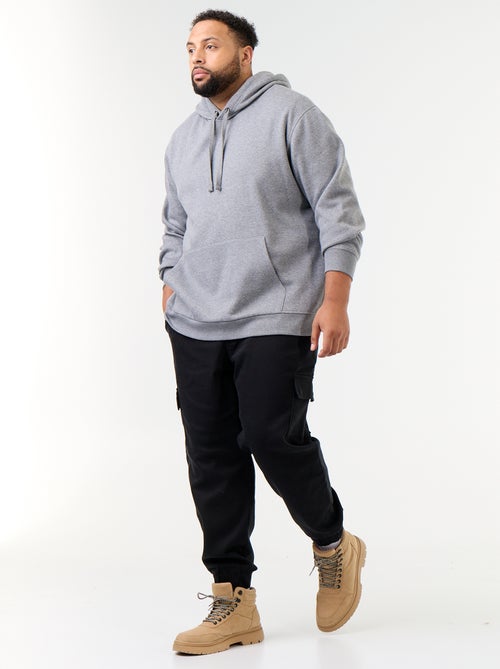 Sweat à capuche et poche kangourou - Kiabi Sweat à capuche et poche kangourou - Kiabi