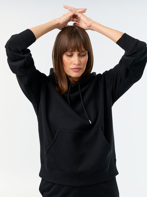 Sweat à capuche uni avec poche kangourou - Kiabi Sweat à capuche uni avec poche kangourou - Kiabi