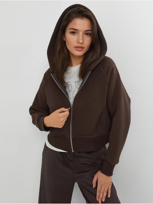 Sweat à capuche zippé coupe décontractée hiccup - Kiabi Sweat à capuche zippé coupe décontractée hiccup - Kiabi