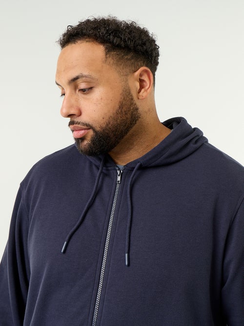 Sweat à capuche zippé uni - Kiabi Sweat à capuche zippé uni - Kiabi