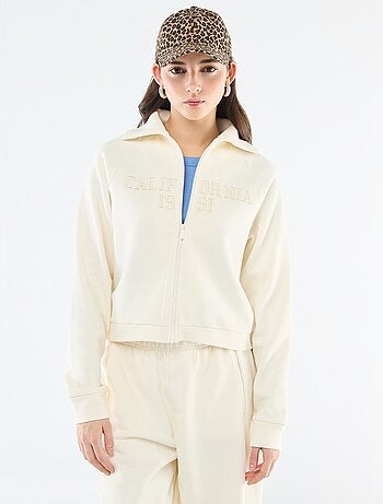 Sweat court zippé à message brodé