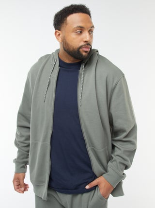 Sweat en maille piquée avec ouverture zippée et capuche