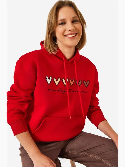Sweat-shirt à capuche à triple fil brossé et imprimé cœur lucci - Kiabi Sweat-shirt à capuche à triple fil brossé et imprimé cœur lucci - Kiabi