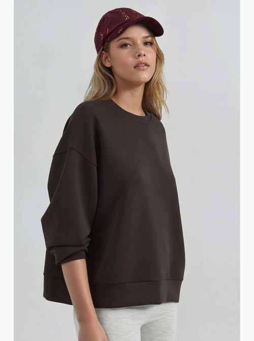 Sweat-shirt à col rond coupe décontractée busem - Kiabi Sweat-shirt à col rond coupe décontractée busem - Kiabi