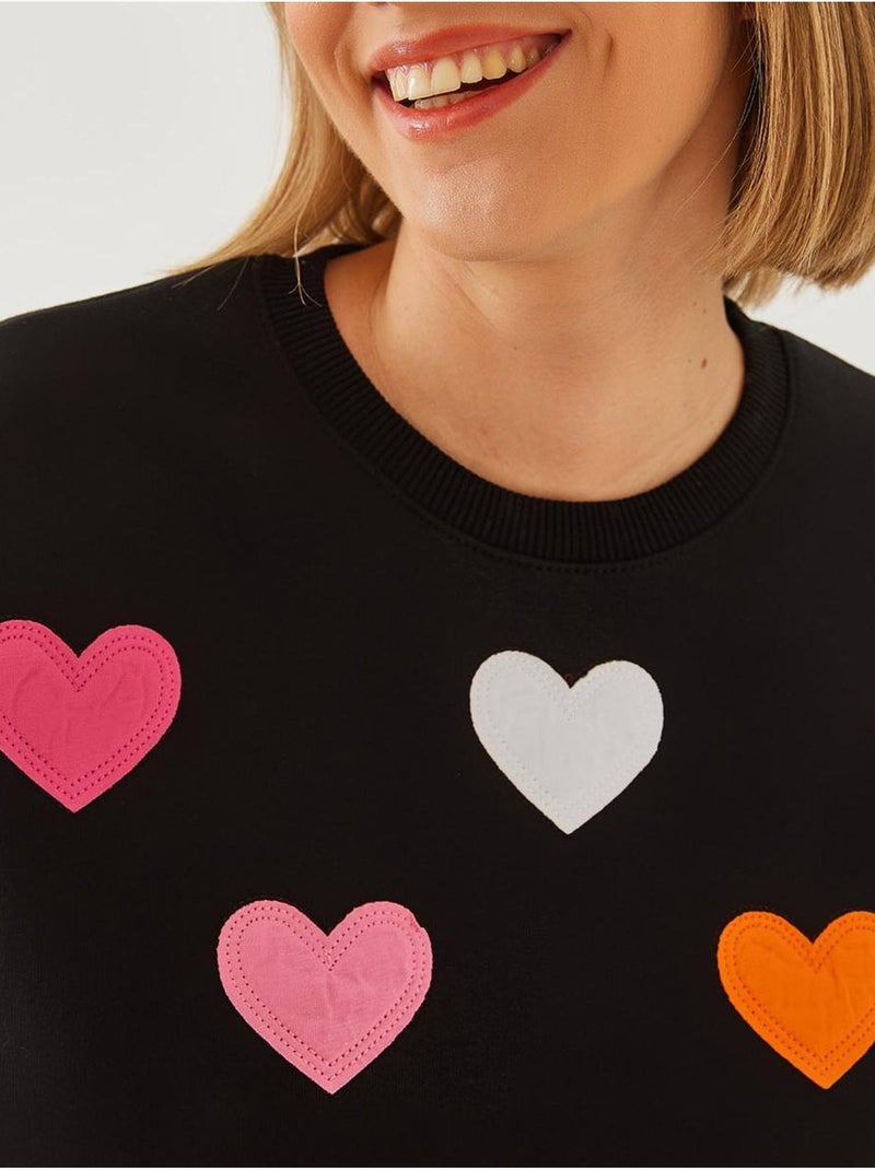 Sweat-shirt brossé triple fil brodé cœur lucci Noir - Kiabi