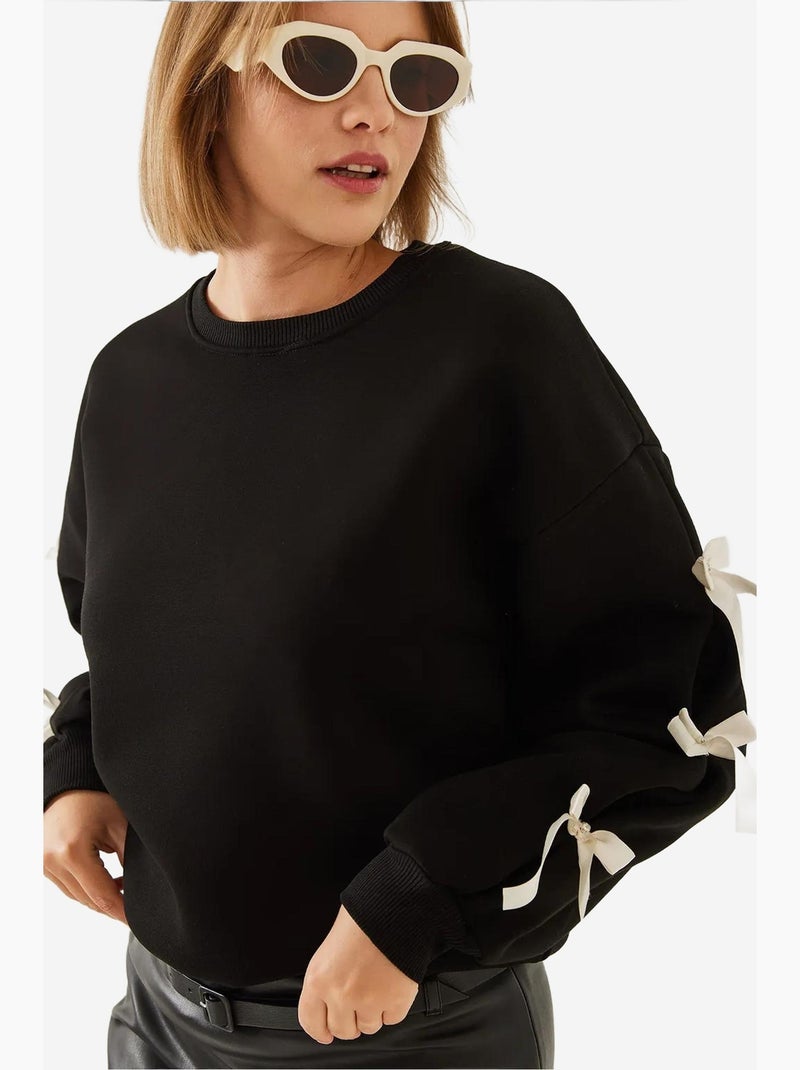 Sweat-shirt brossé trois fils avec manches à nœud lucci Noir - Kiabi