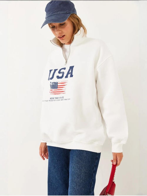Sweat-shirt col montant demi-zippé à imprimé usa lucci - Kiabi Sweat-shirt col montant demi-zippé à imprimé usa lucci - Kiabi
