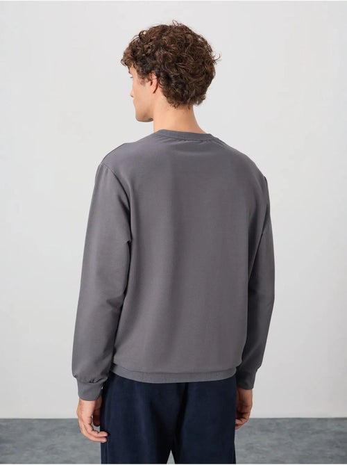 Sweat-shirt homme col rond uni tommy - Kiabi Sweat-shirt homme col rond uni tommy - Kiabi
