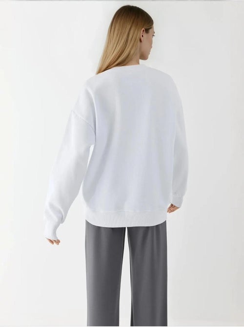 Sweat-shirt imprimé à col rond hiccup - Kiabi Sweat-shirt imprimé à col rond hiccup - Kiabi