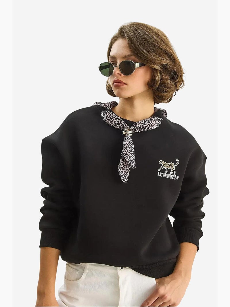 Sweat-shirt ras du cou brodé à imprimé léopard lucci Noir - Kiabi