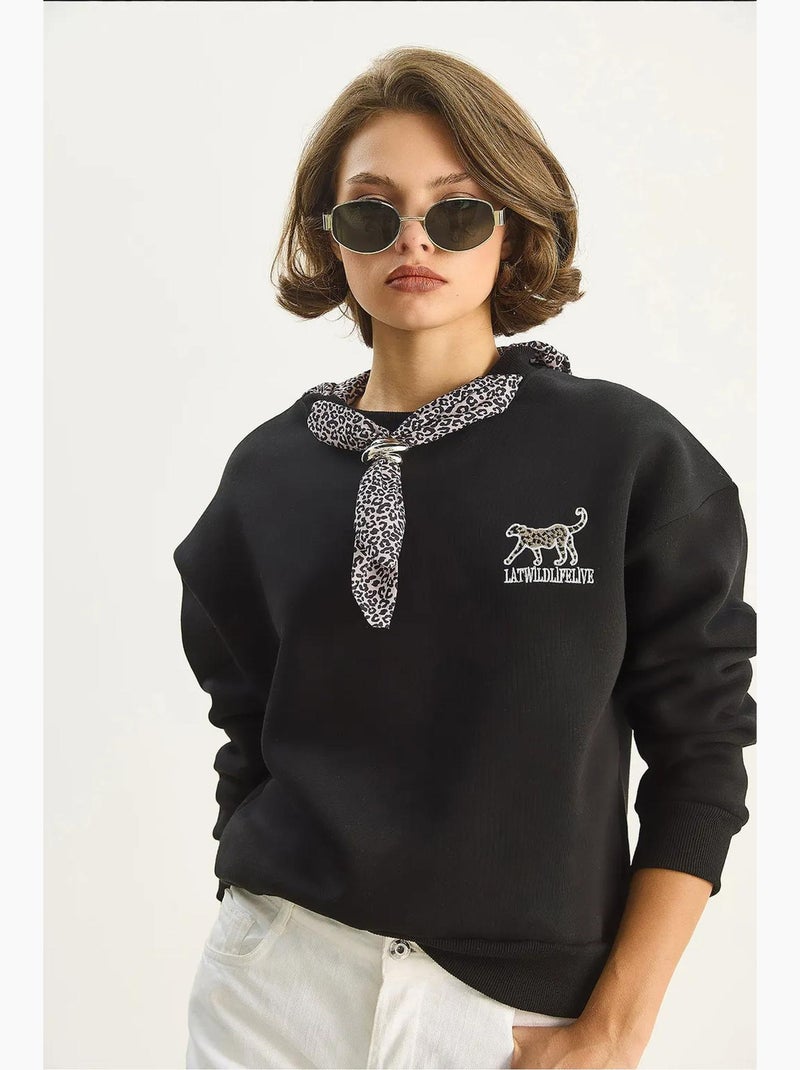 Sweat-shirt ras du cou brodé à imprimé léopard lucci Noir - Kiabi