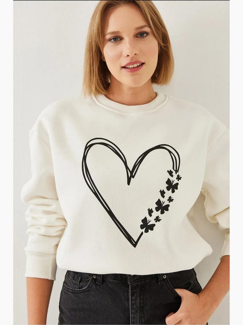 Sweat-shirt ras du cou en fil brossé imprimé cœur lucci - Kiabi Sweat-shirt ras du cou en fil brossé imprimé cœur lucci - Kiabi