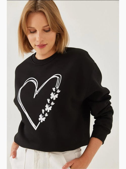 Sweat-shirt ras du cou en fil brossé imprimé cœur lucci - Kiabi Sweat-shirt ras du cou en fil brossé imprimé cœur lucci - Kiabi
