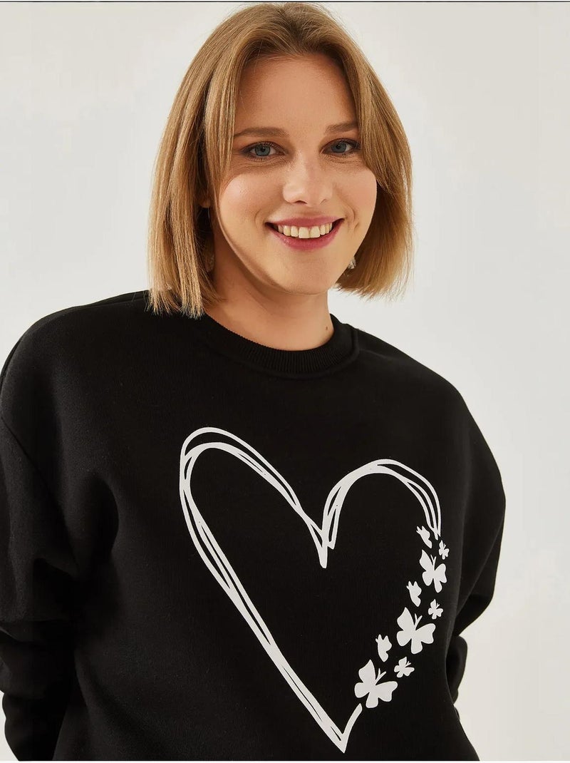 Sweat-shirt ras du cou en fil brossé imprimé cœur lucci Noir - Kiabi