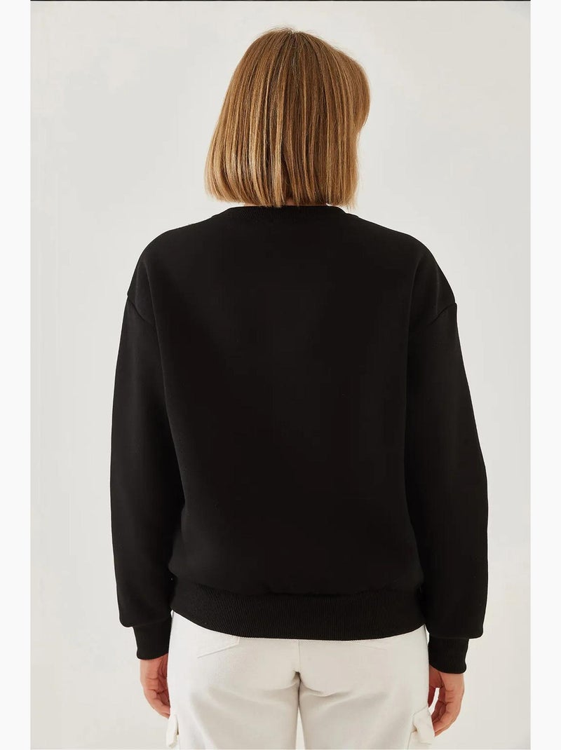 Sweat-shirt ras du cou en fil brossé imprimé cœur lucci Noir - Kiabi