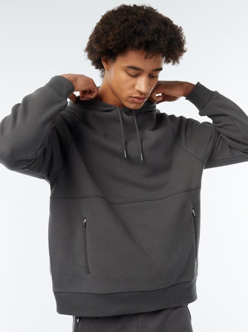 Sweat uni à capuche avec poches zippées - Kiabi