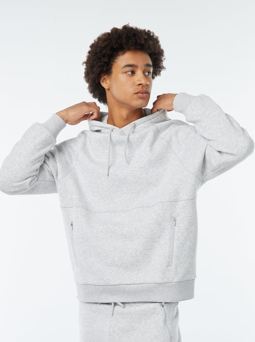 Sweat uni à capuche avec poches zippées - Kiabi