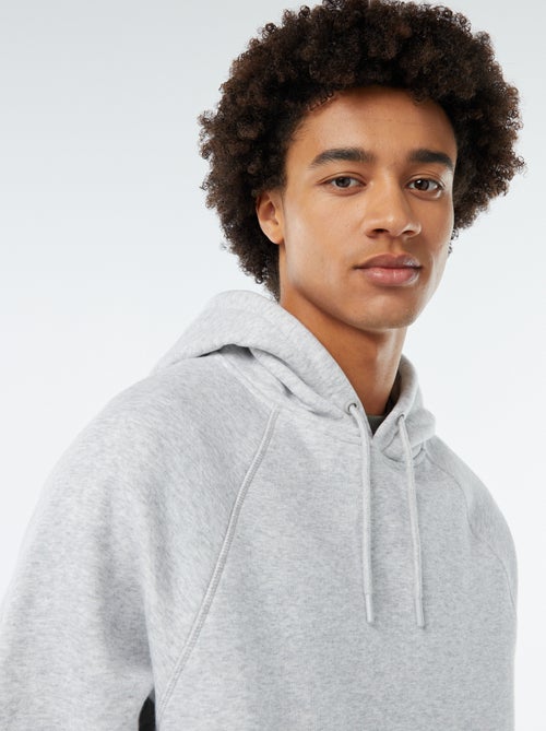 Sweat uni à capuche avec poches zippées - Kiabi