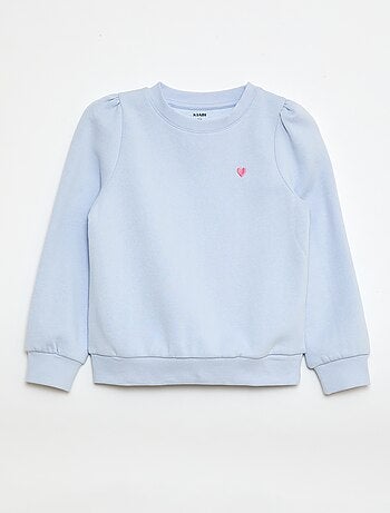 Sweater van joggingstof met borduursel en fronsjes op de schouder