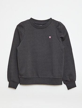 Sweater van joggingstof met borduursel en fronsjes op de schouder