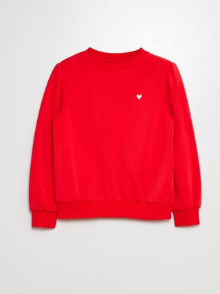 Sweater van joggingstof met borduursel en fronsjes op de schouder