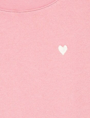 Sweater van joggingstof met borduursel en fronsjes op de schouder